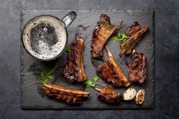 Should you boil ribs before grilling