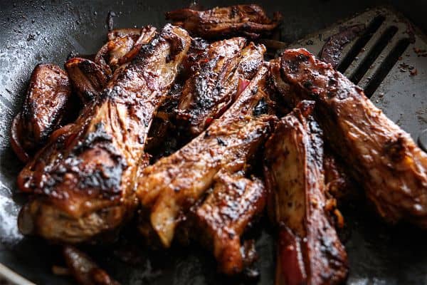 Should you boil ribs before grilling